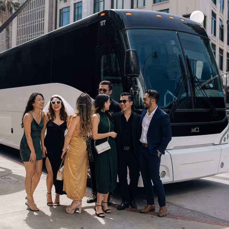Passengers loading luggage while boarding an San Bernadino group shuttle
