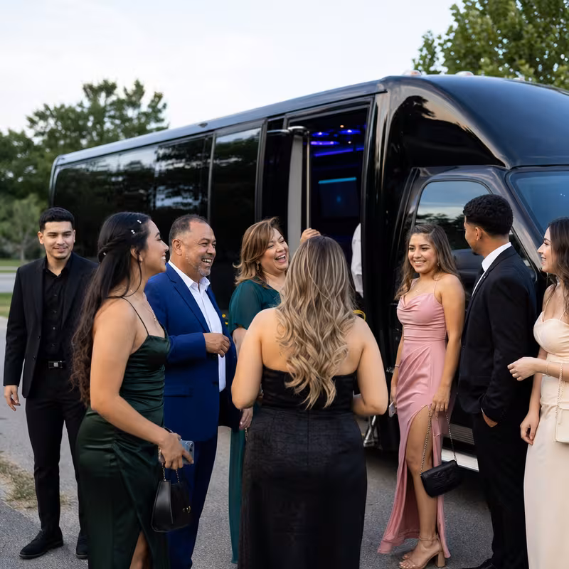 Passengers loading luggage while boarding an San Bernadino group shuttle