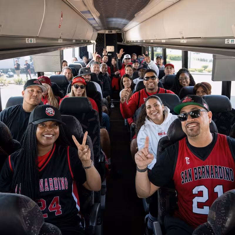 Black Mercedes Sprinter van staged for an San Bernadino Sporting Event Transportation group