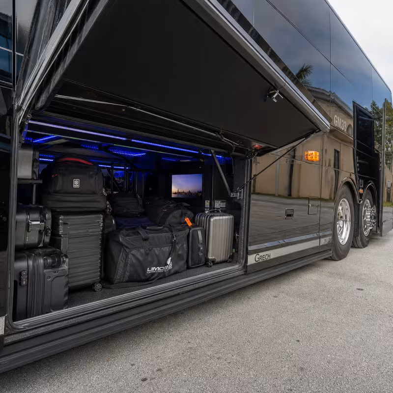 Party bus interior with wraparound leather seating and LED lighting in San Bernadino